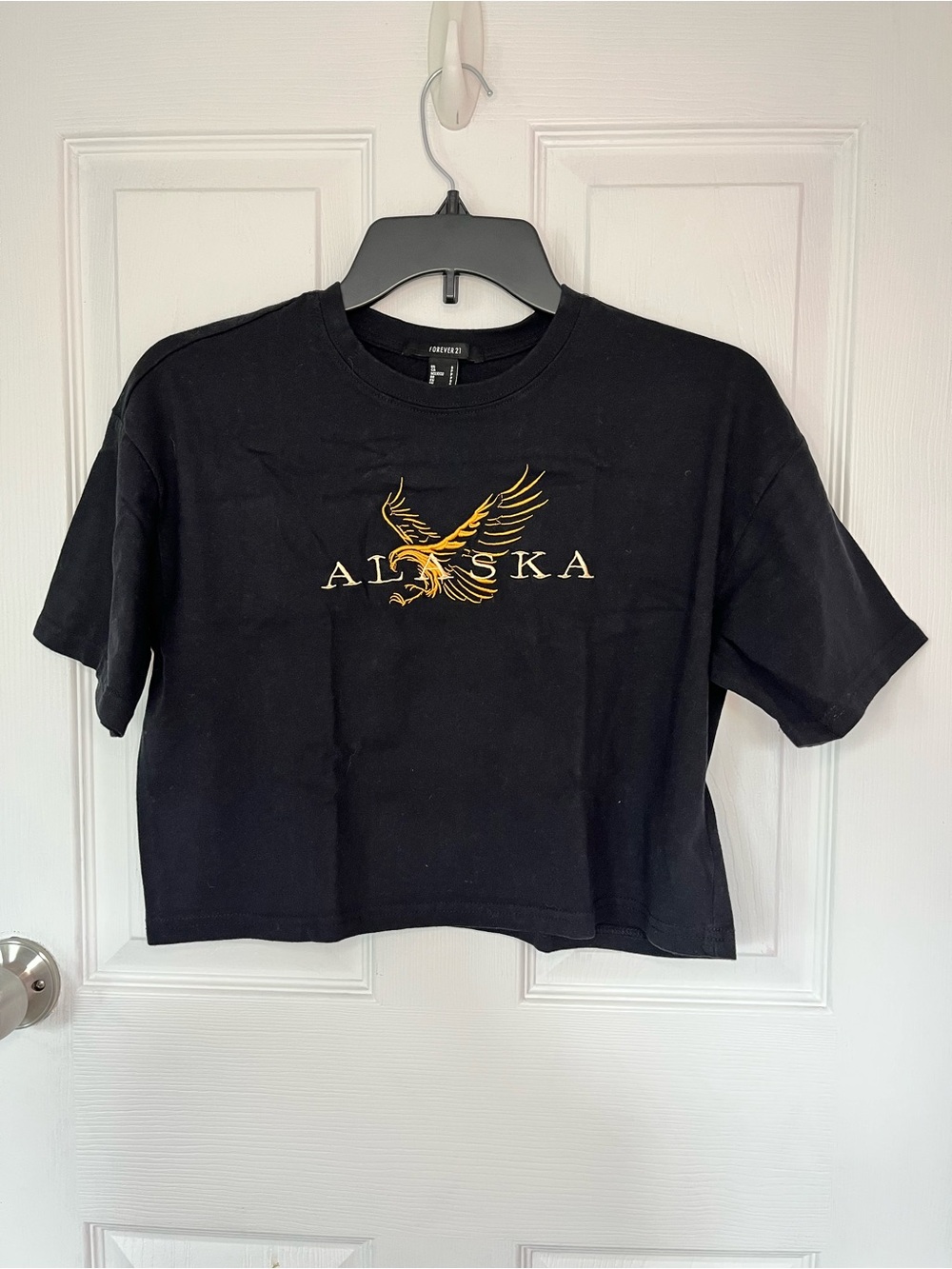 Forever 21 black cropped tee with gold eagle size small